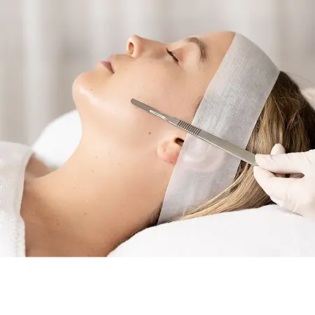 A dermaplaning treatment in progress