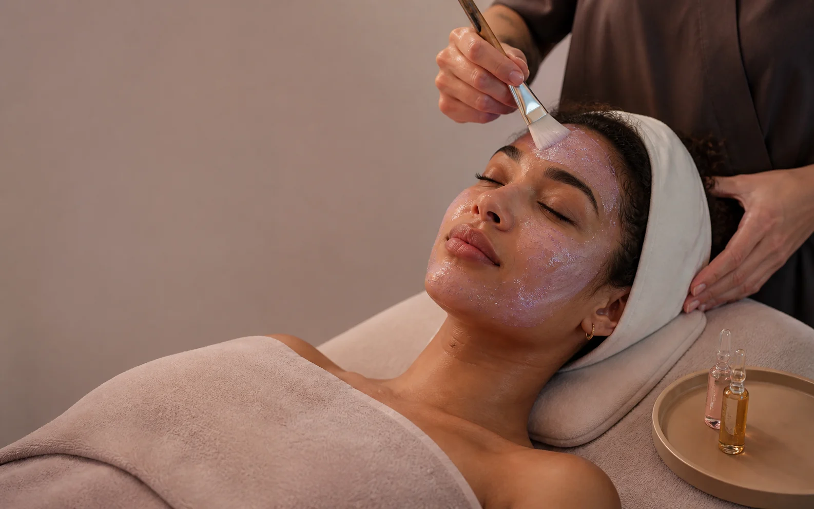 Client receiving a personalized facial treatment at Mirra Bella in Sherman Oaks